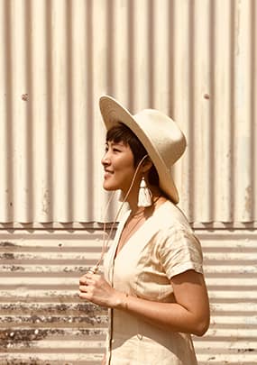 Woman Wearing Weaved Hat